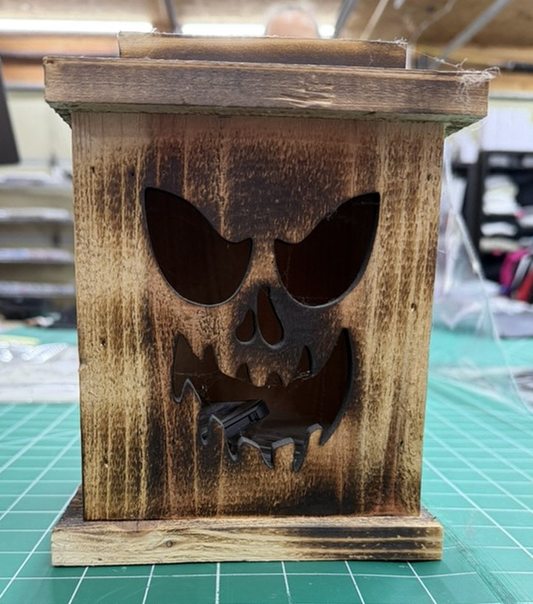 Halloween scary pumpkin wood lantern, front view