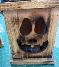 Halloween happy pumpkin wood lantern, front view