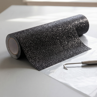 Roll of black glitter heat transfer vinyl